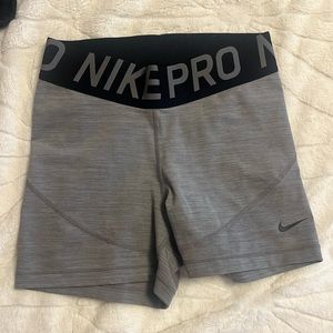 grey nike pros 3in